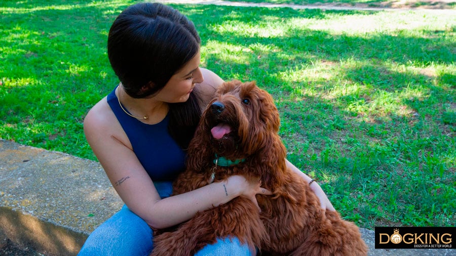 Girl giving love to her dog