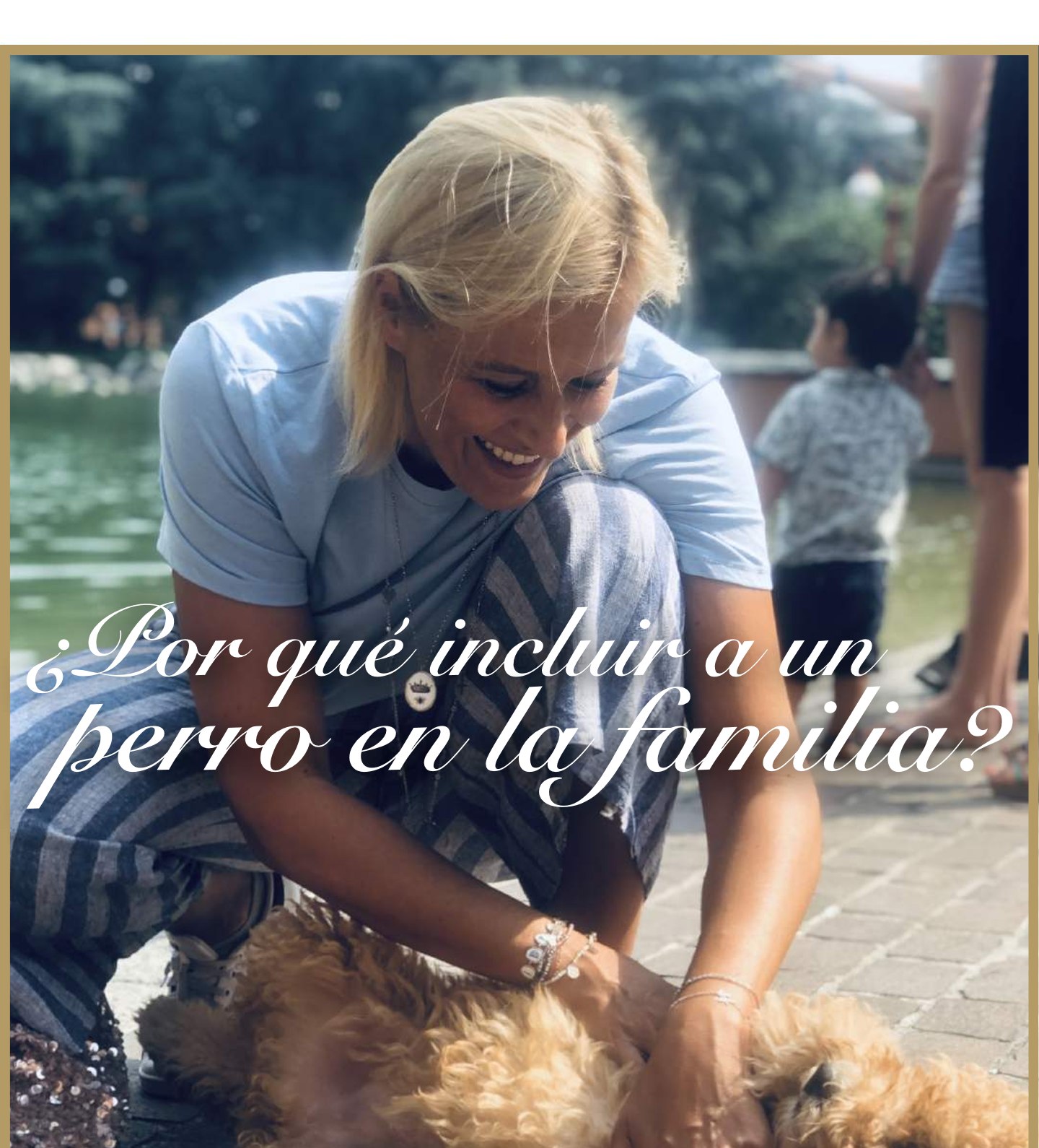Woman happily stroking her Australian Cobberdog in the park
